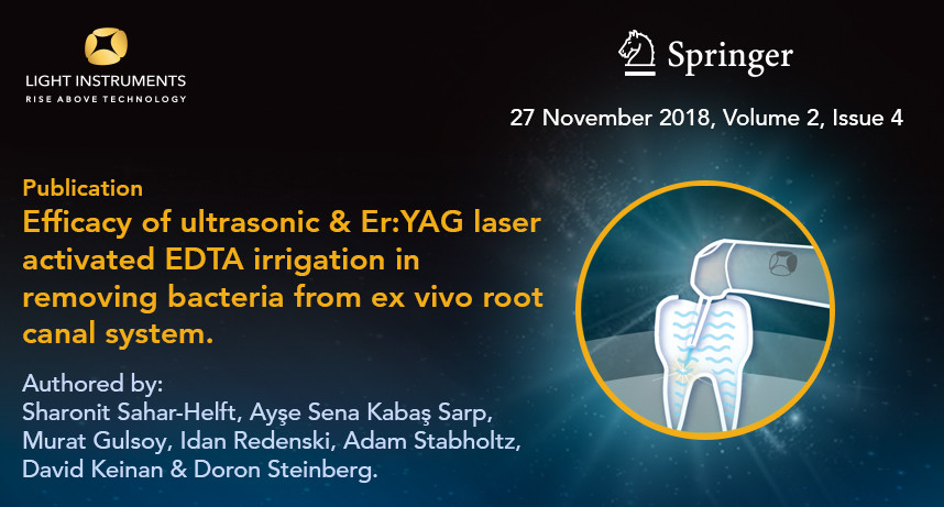Efficacy of ultrasonic and Er:YAG laser activated EDTA irrigation in removing bacteria from ex vivo root canal system
